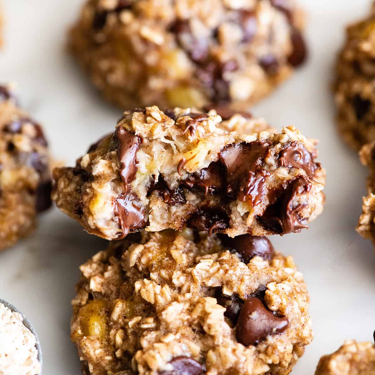 front photo of a Banana Oatmeal Cookie with a bite taken out of it