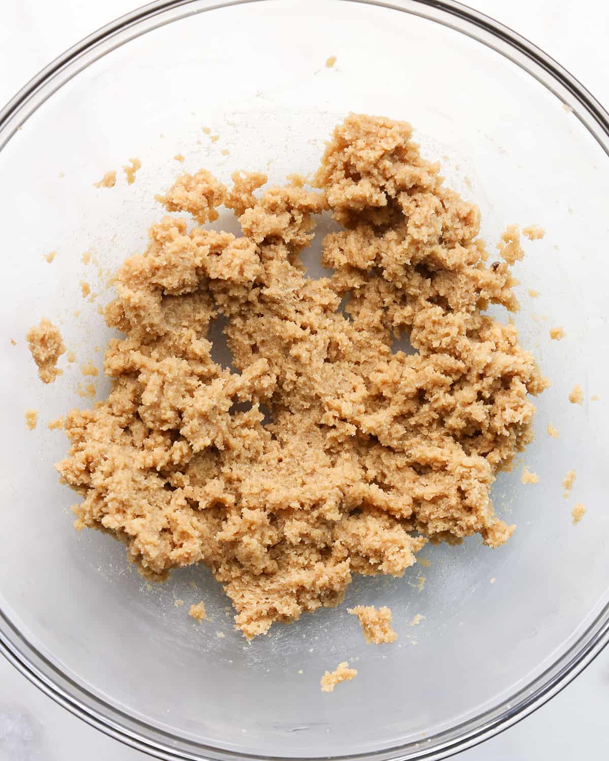making a Chocolate Chip Skillet Cookie  - butter and sugars in a bowl after beating