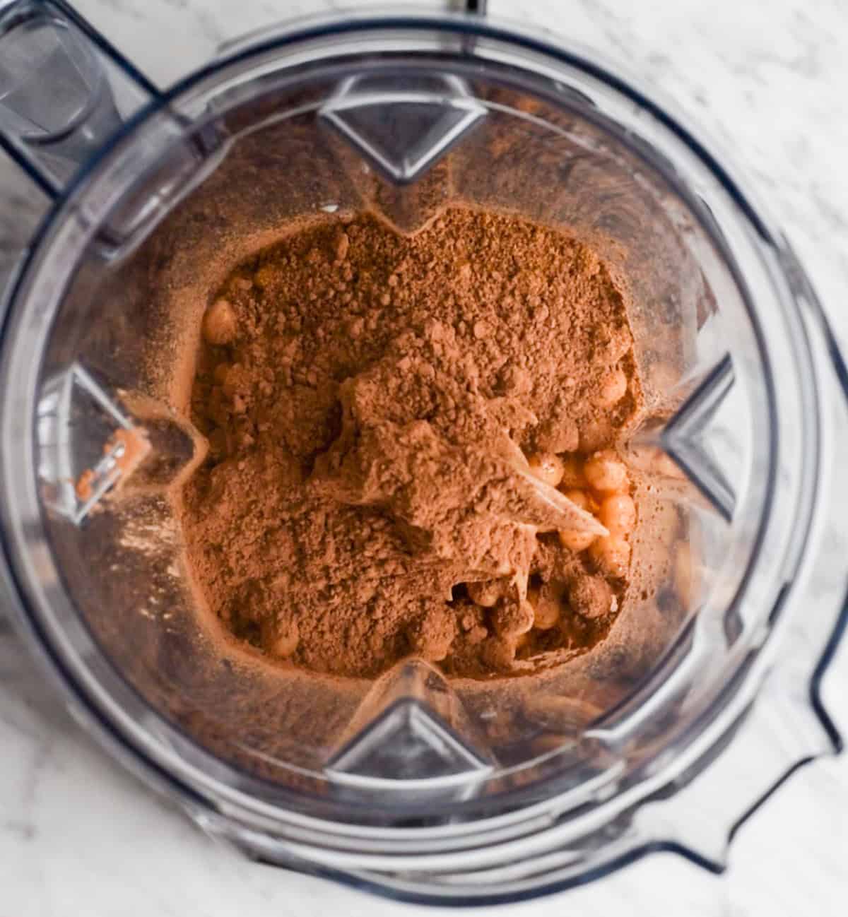 How to Make Chocolate Hummus - adding ingredients to the blending container before blending