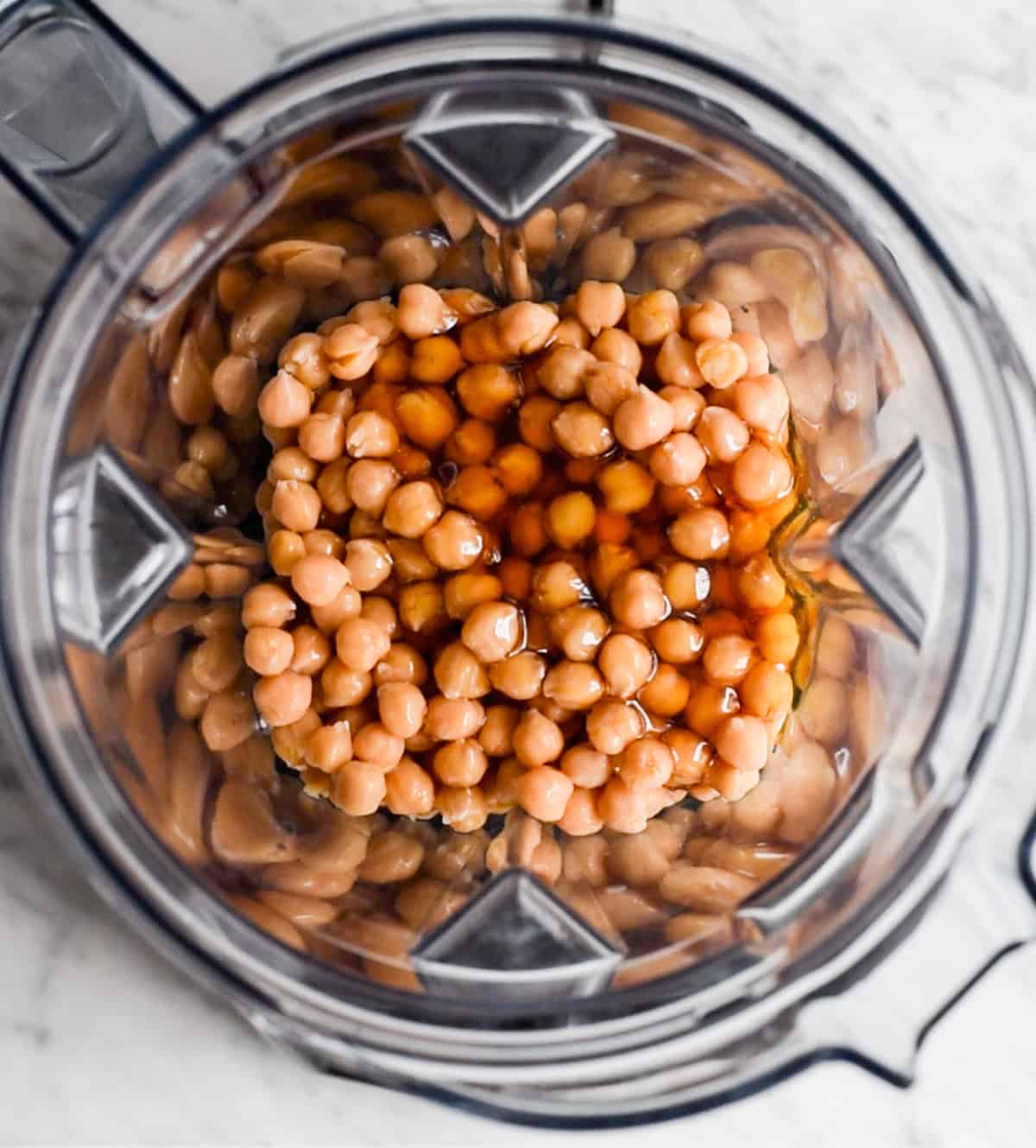 How to Make Chocolate Hummus - adding ingredients to the blending container before blending