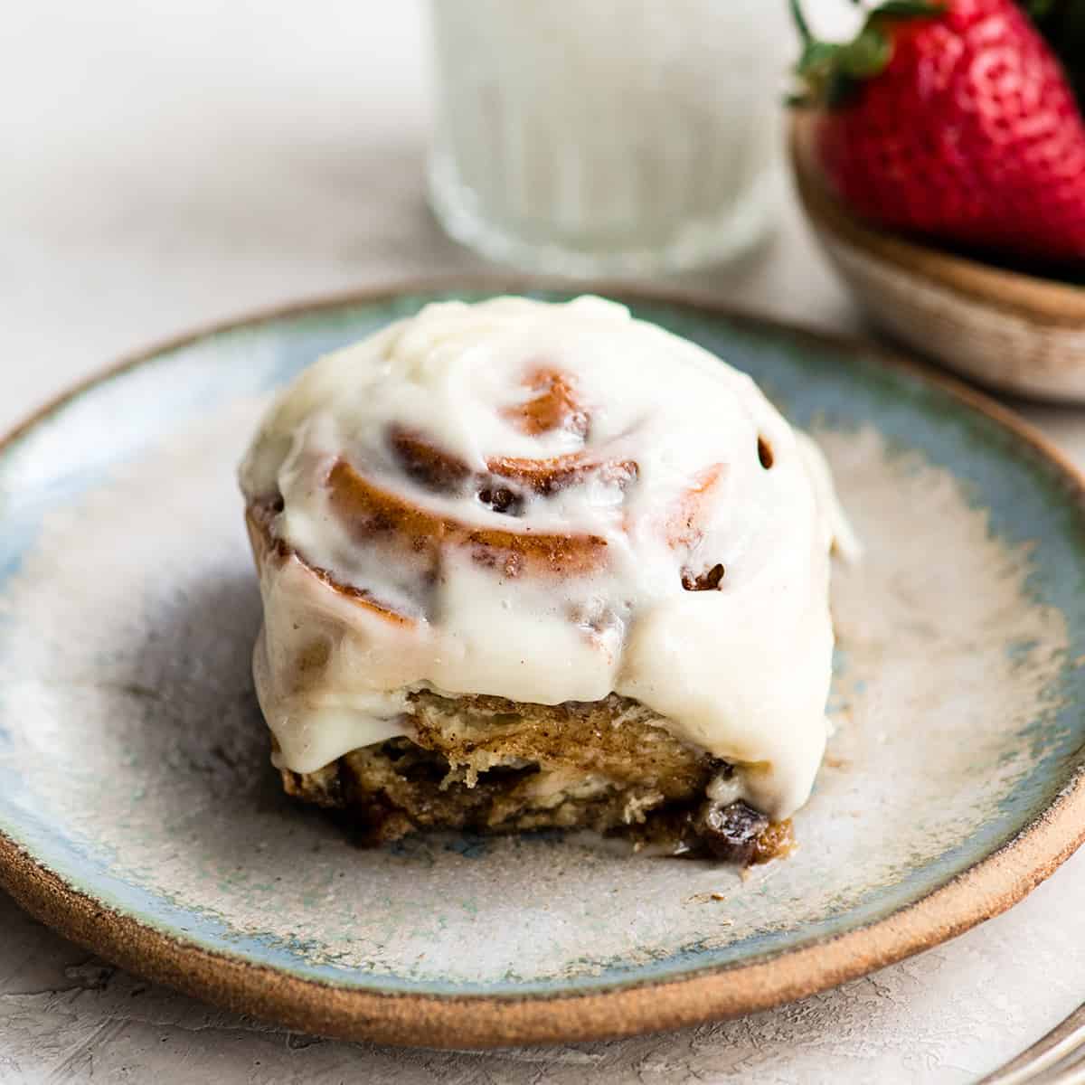 front view of a cinnamon roll on a plate