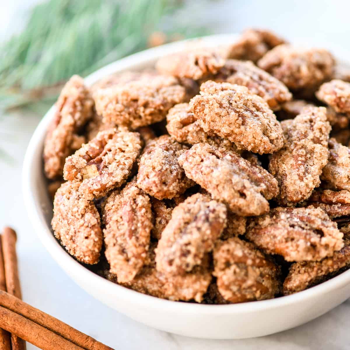 a bowl of Cinnamon Sugar Pecans 