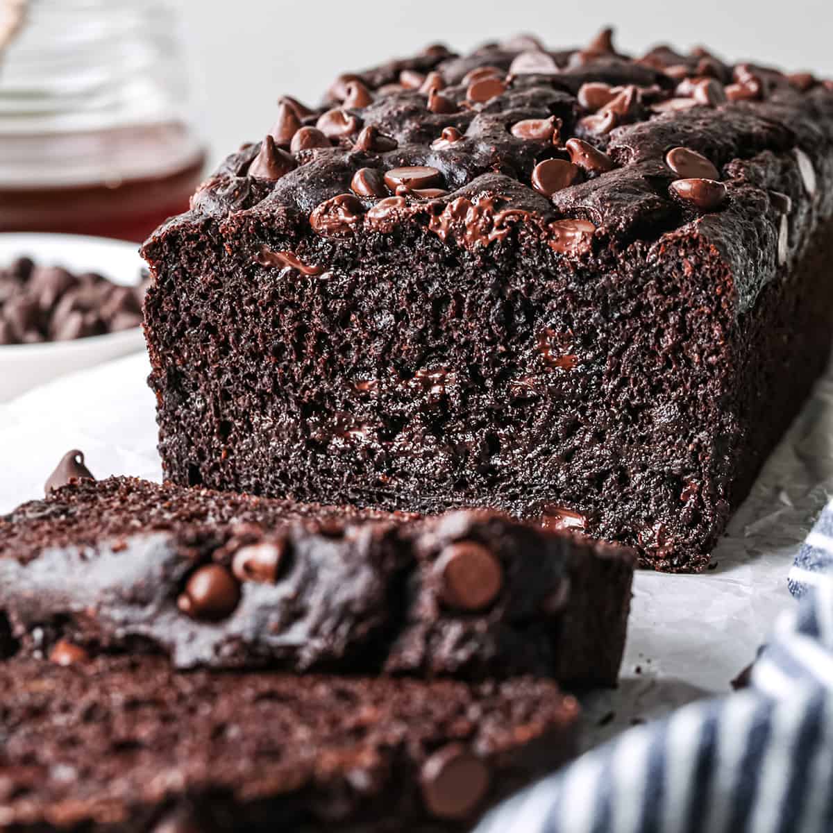 a loaf of Healthy Chocolate Banana Bread with two slices cut out of it