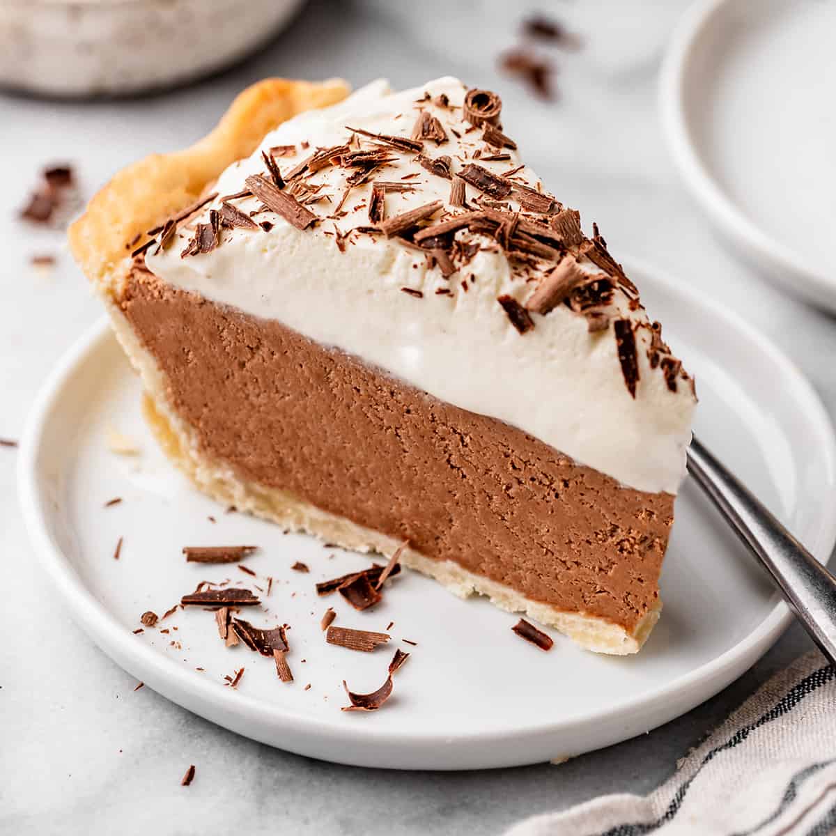 front view of a slice of French silk pie on a plate