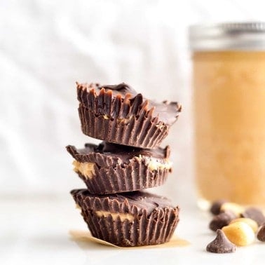 Front view of three Healthy Homemade Peanut Butter Cups stacked on top of each other.
