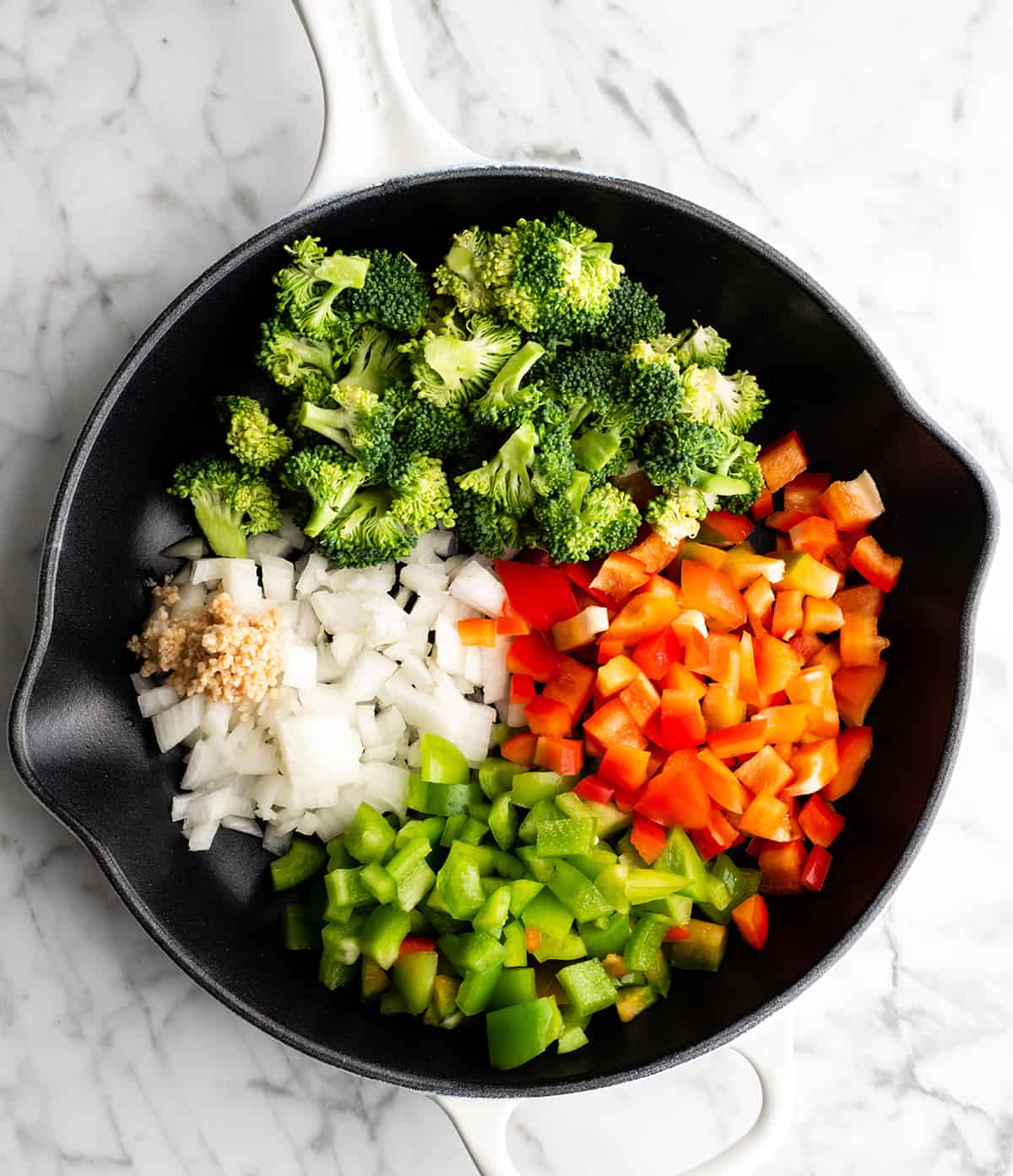 photo showing how to make this frittata recipe sautéing vegetables