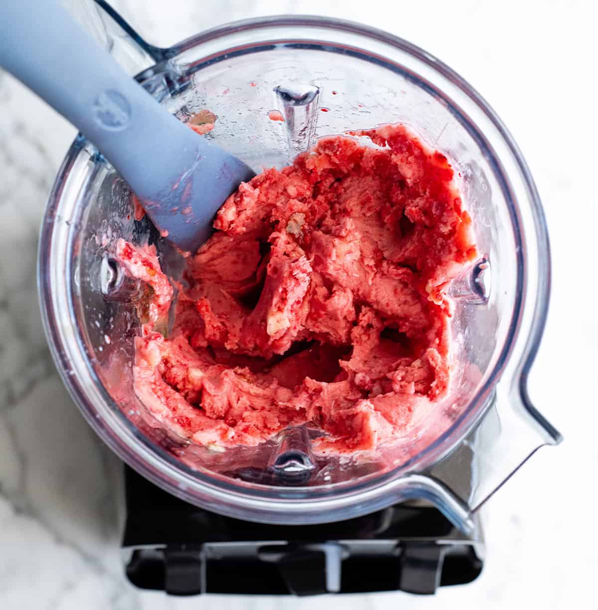 overhead photo showing how to make a smoothie bowl in a Vitamix blender