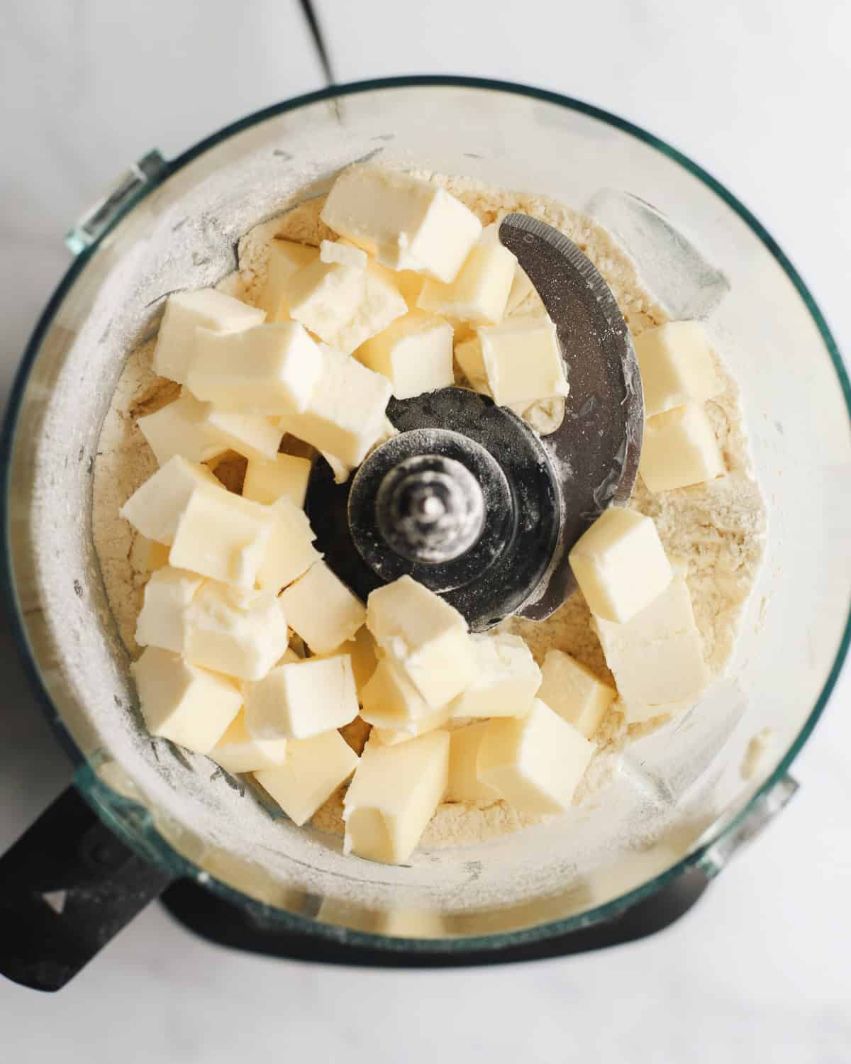 How to Make a Butter Pie Crust adding butter and water