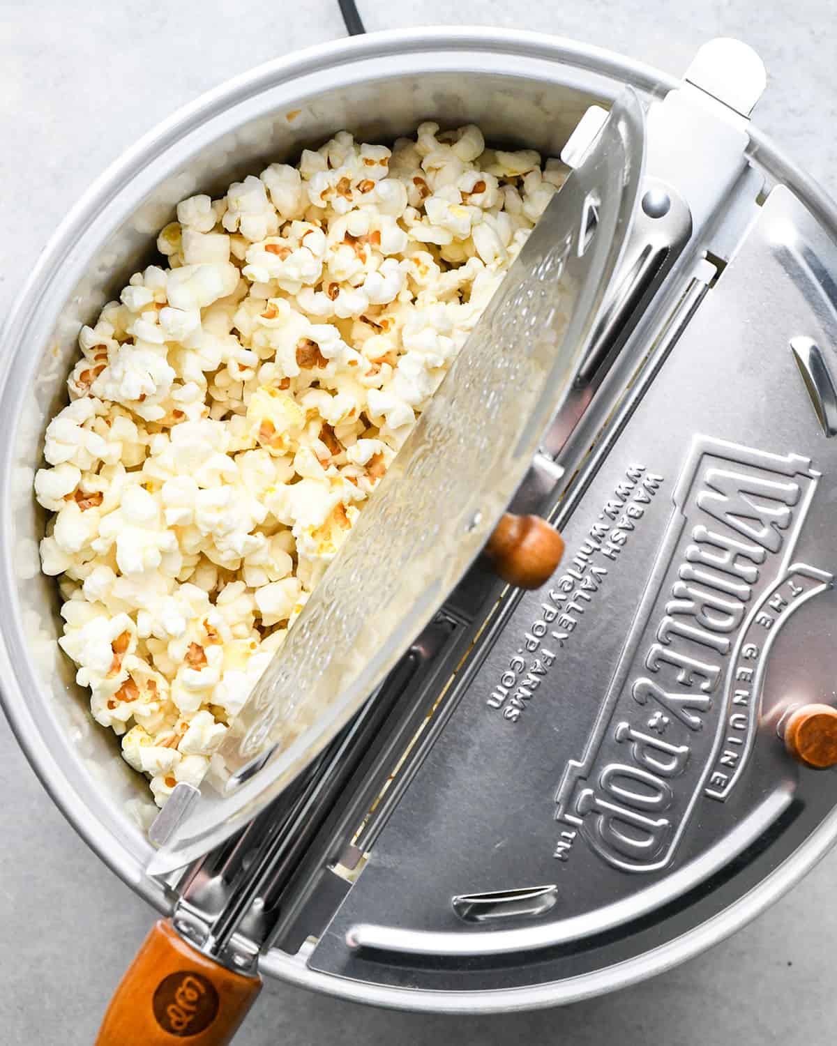 popped popcorn kernals in a popcorn maker 