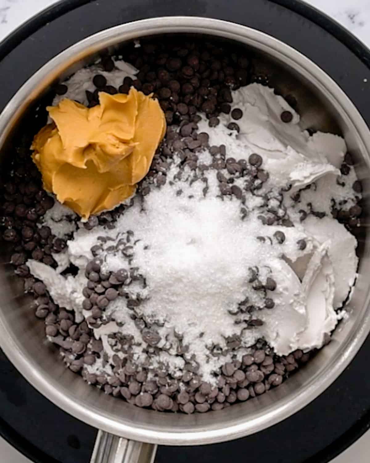  Chocolate Peanut Butter Fondue  ingredients in a pot before melting and stirring