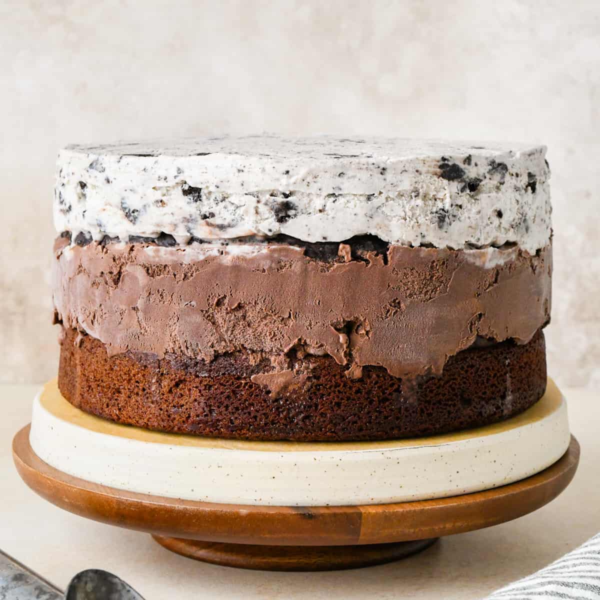 ice cream cake on a plate with the cake layer on the bottom 
