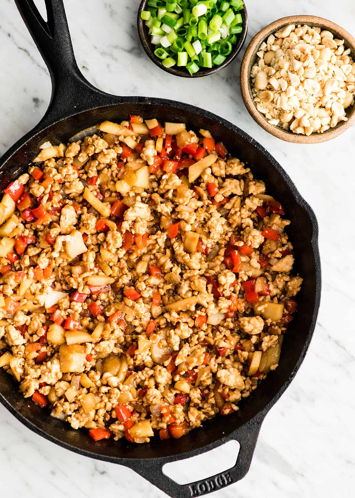 chicken lettuce wrap filling in a skillet