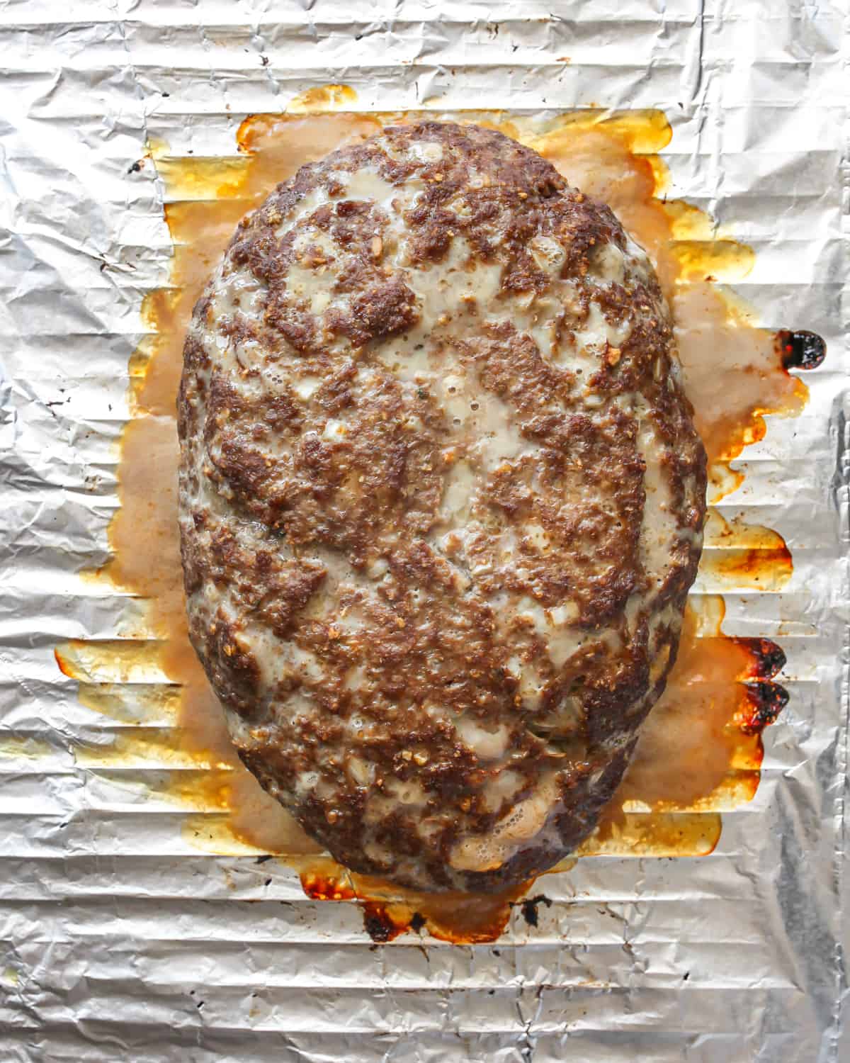 How to Make Meatloaf  - meatloaf on a wire rack after baking 