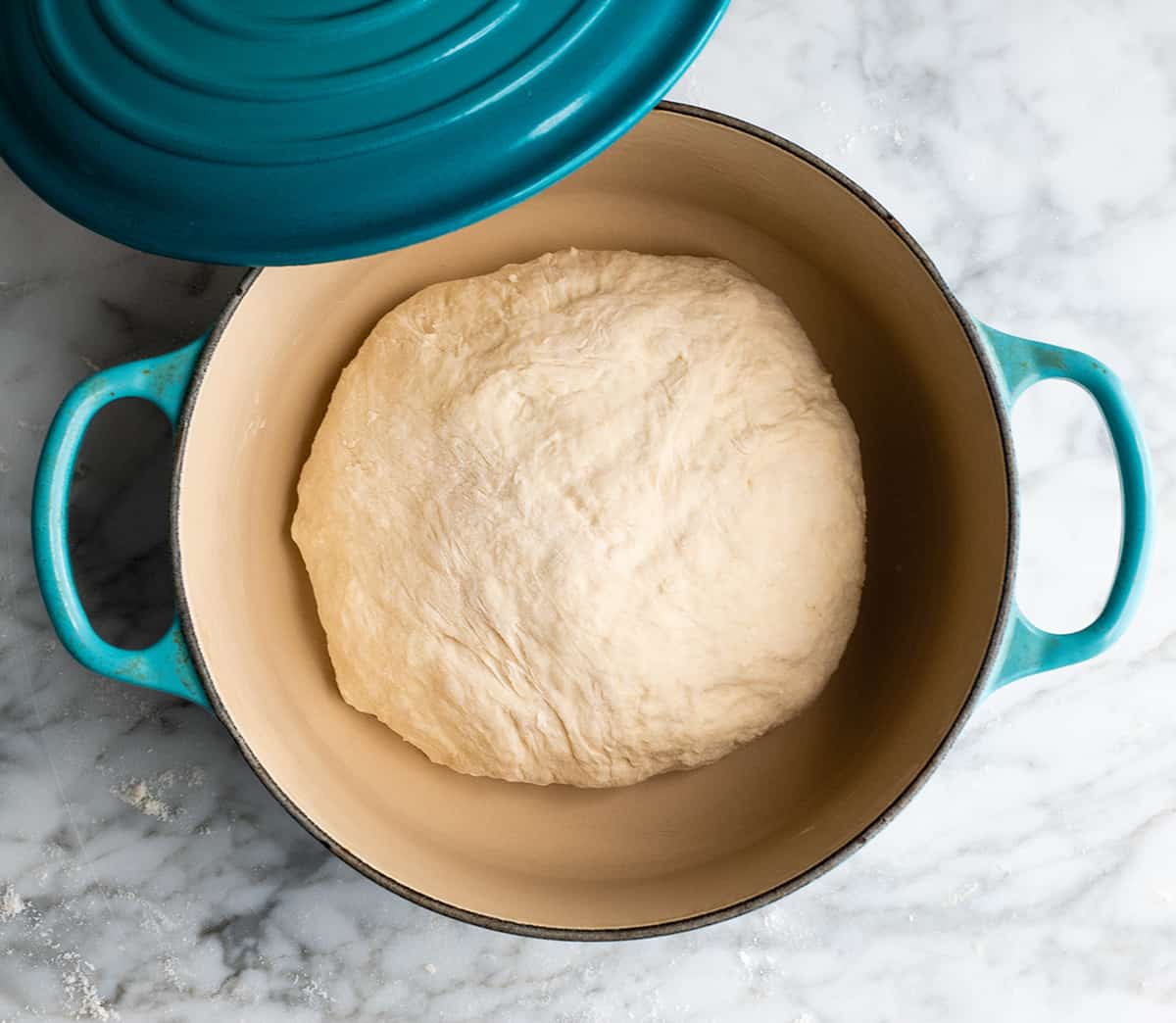 overhead photo showing how to make dutch oven bread dough before baking in dutch oven
