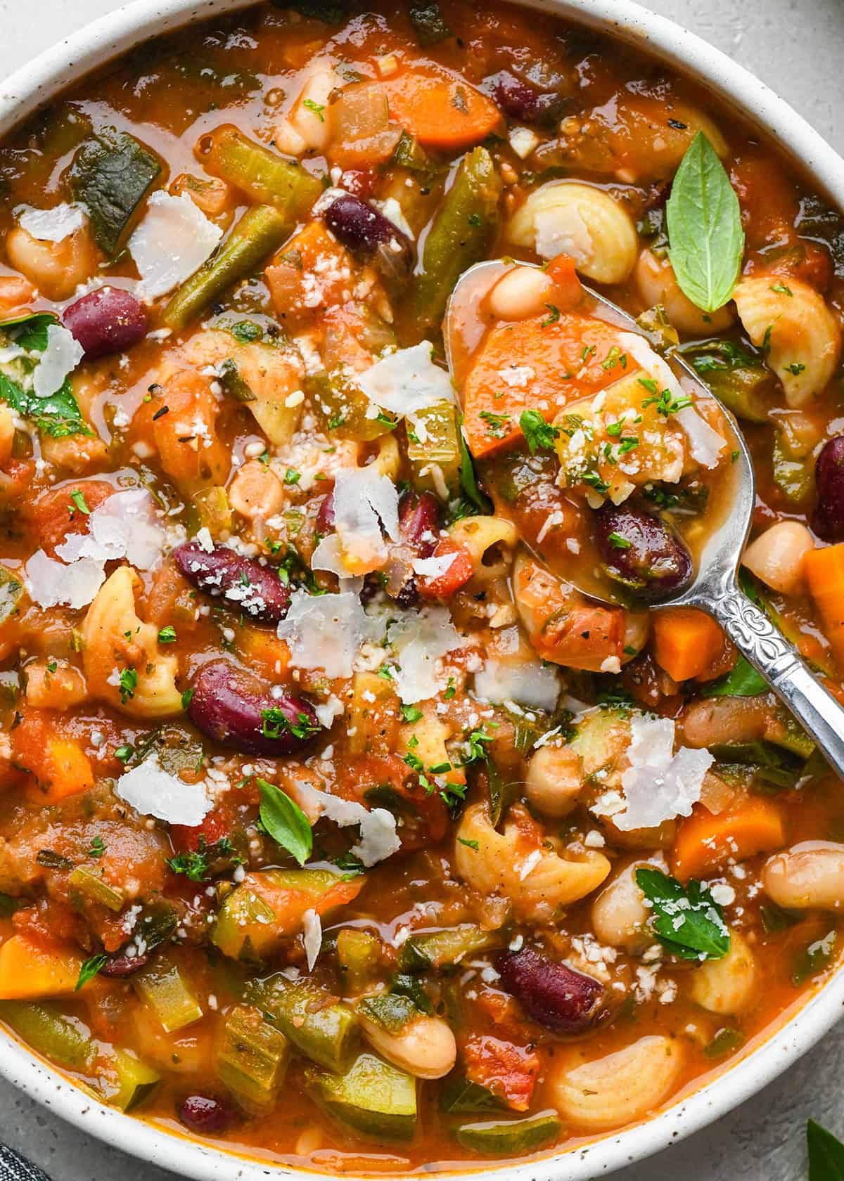 Minestrone Soup in a bowl with a spoon