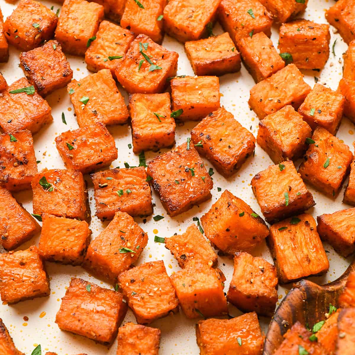 Oven Roasted Sweet Potatoes garnisehd with parsley