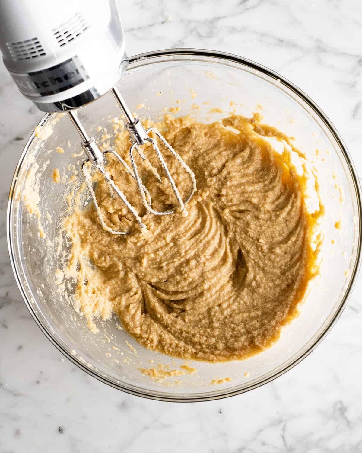 making a Chocolate Chip Skillet Cookie  - after beating in vanilla egg and milk